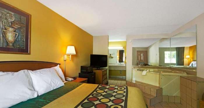 Room with a whirlpool tub in Super 8 by Wyndham Charlotte Downtown Area hotel, NC